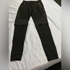 Runway joggers with rose gold hardware and vents at knees